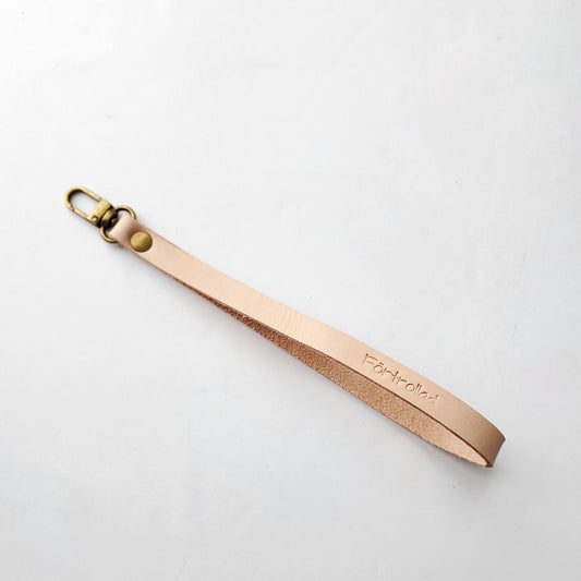 Wristlet vegetable tanned leather