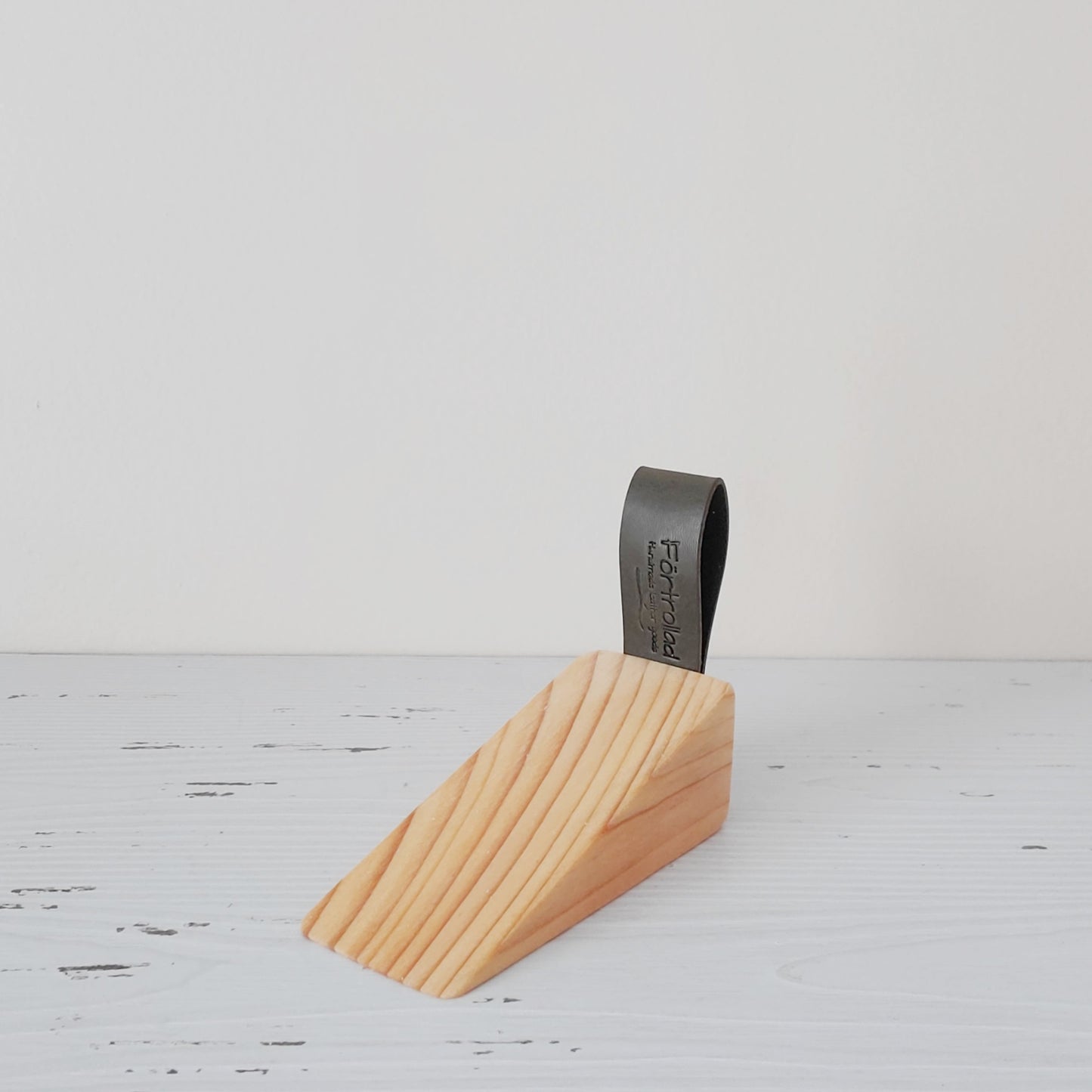 Isa wooden doorstop